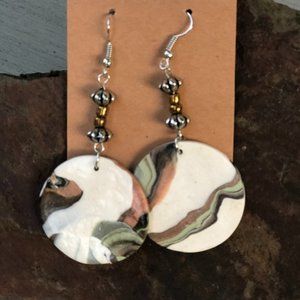 Clay circle earrings with earth tone ribbons